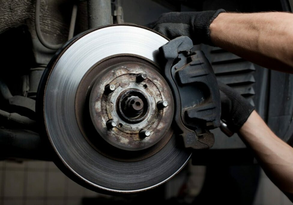 Brake Repairs Mechanic working on car brakes